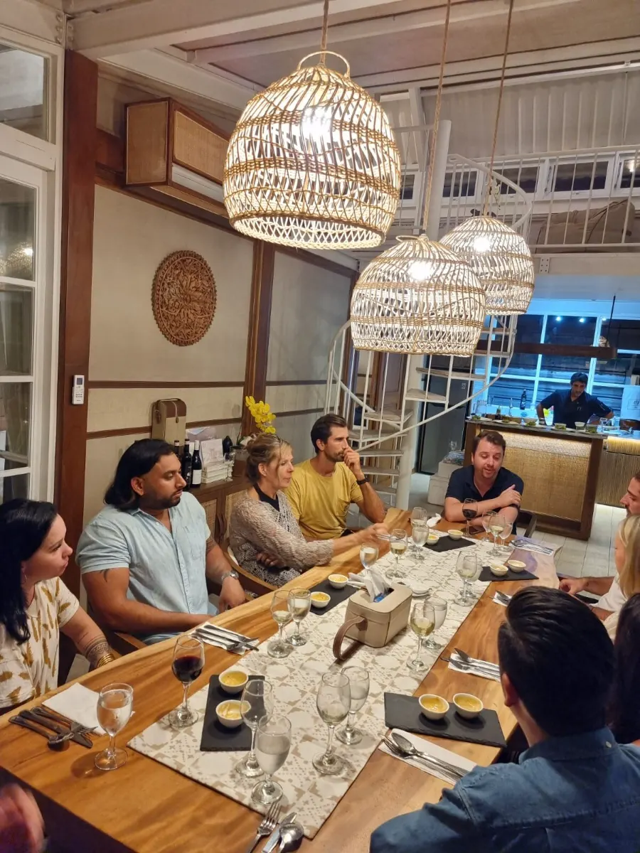 A peer group of founders around one table
